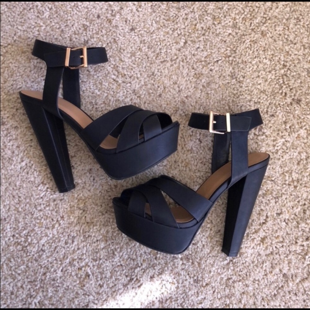 Black strappy heels with gold detailing